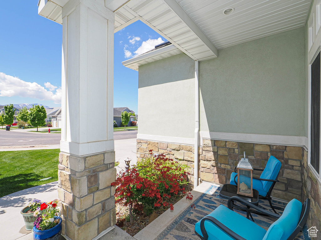 View of patio featuring a porch