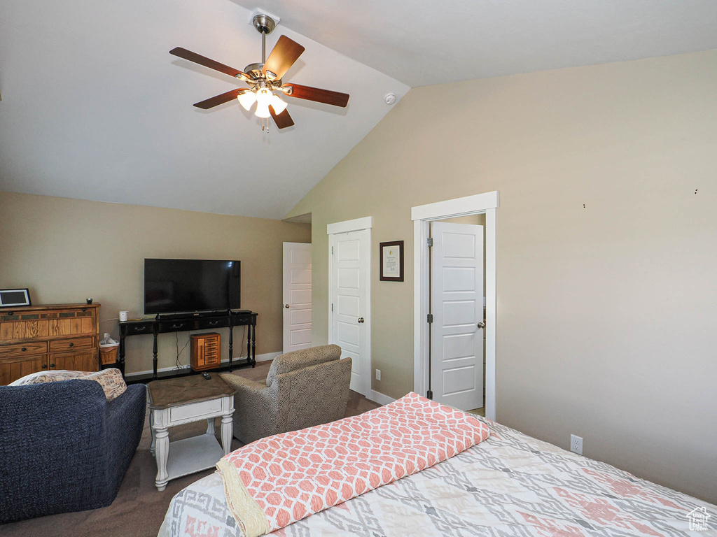 Bedroom featuring carpet, high vaulted ceiling, and ceiling fan