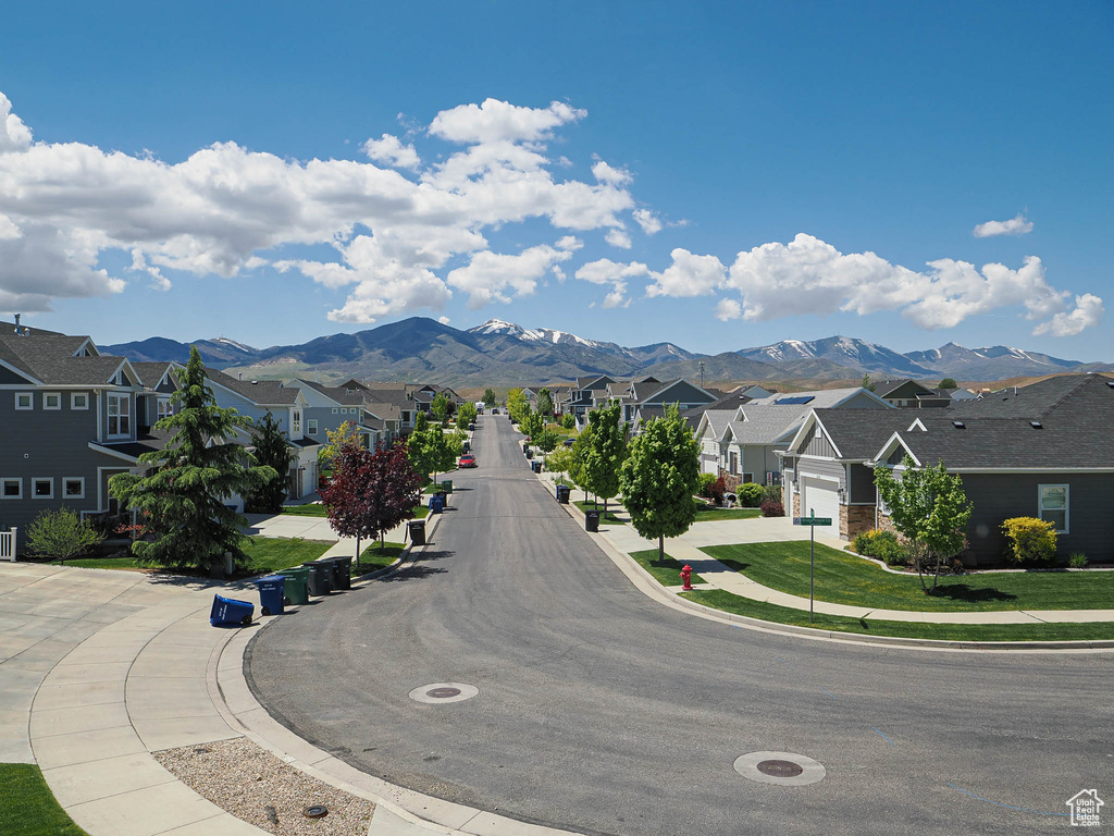 View of mountain backdrop with nearby suburban area