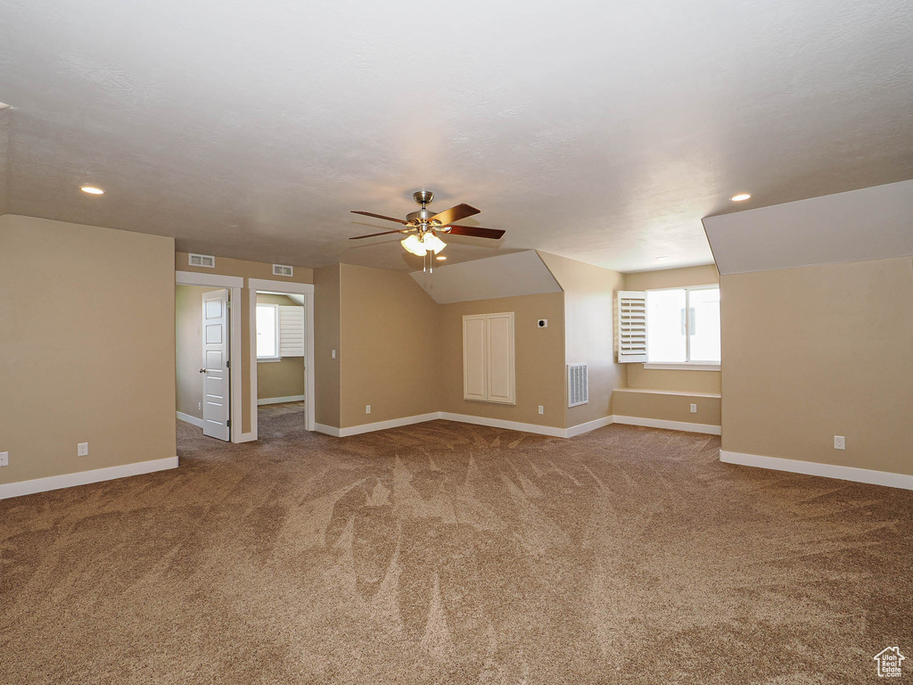 Bonus room featuring ceiling fan, carpet floors, baseboards, and recessed lighting
