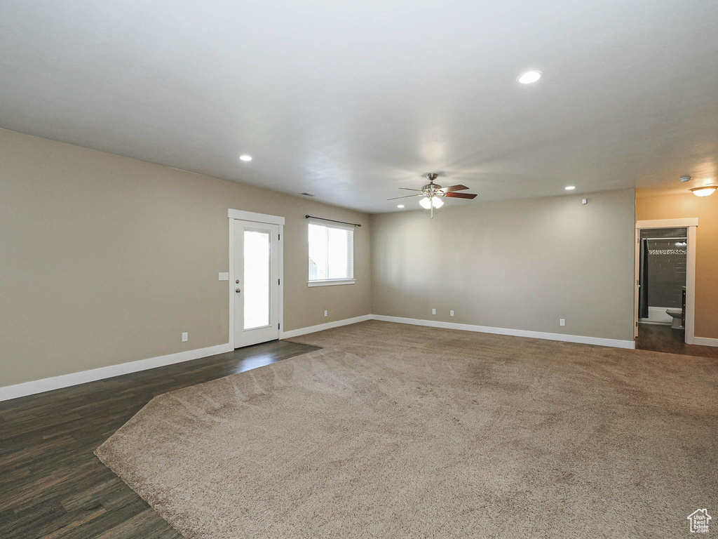 Empty room with ceiling fan, baseboards, and recessed lighting