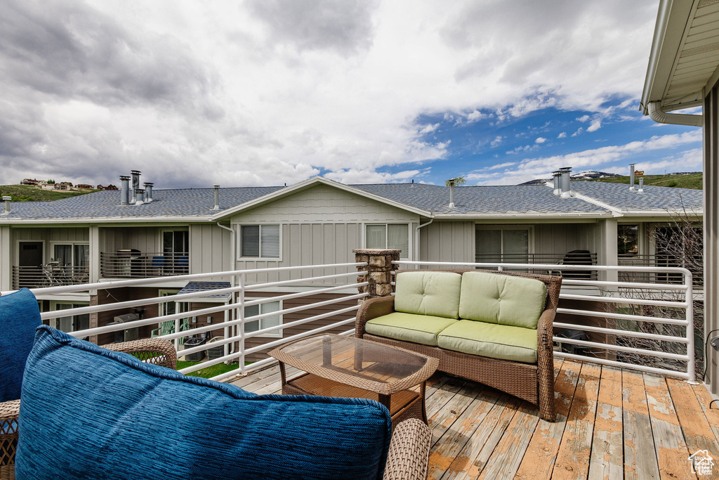 Wooden terrace with outdoor lounge area