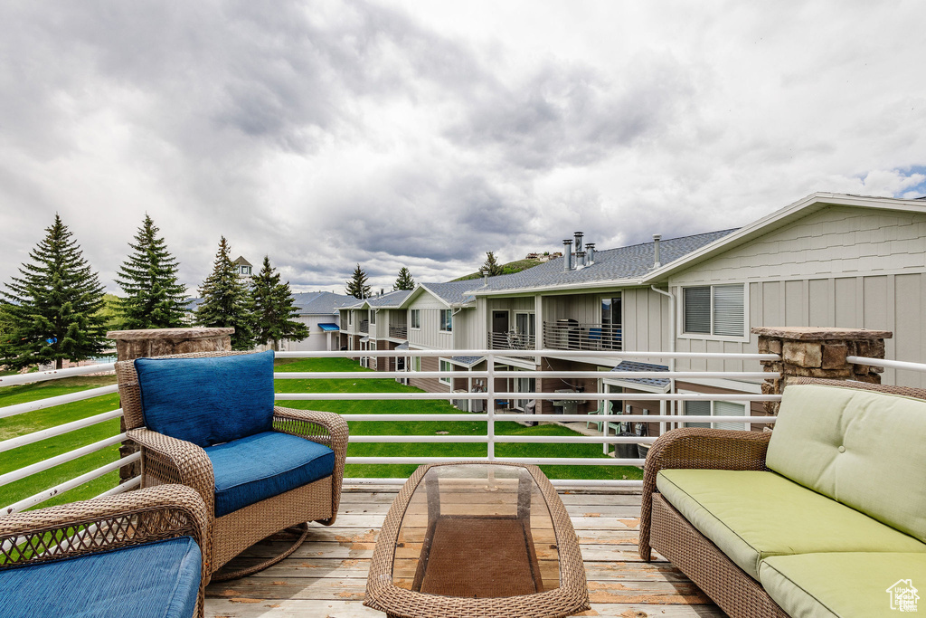 Deck featuring outdoor lounge area