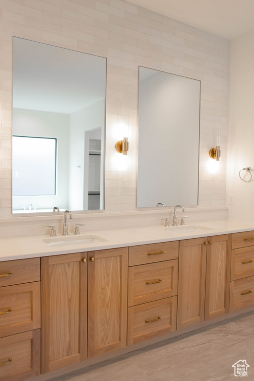 Bathroom with double vanity and a sink