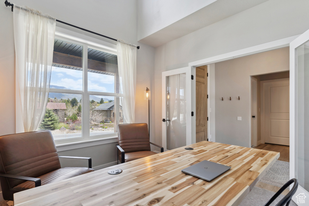 Office area with wood finished floors
