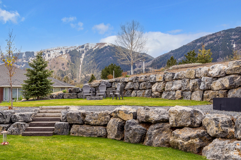 Exterior space featuring a mountain view