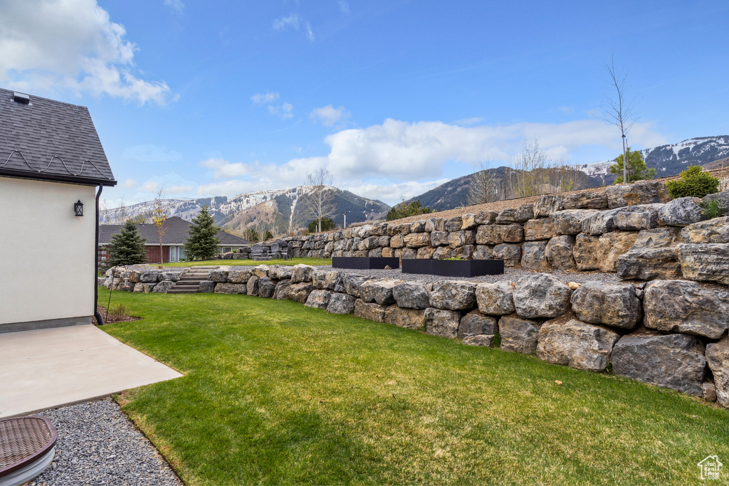 View of yard with a mountain view