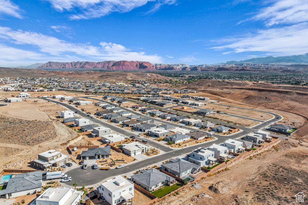 Aerial view of residential area with mountains