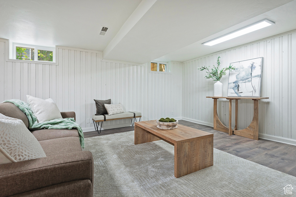 Living area featuring wood finished floors and baseboards