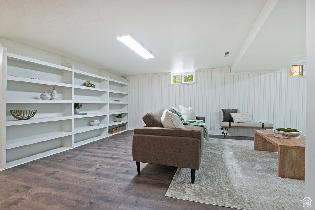 Sitting room with dark wood-style flooring