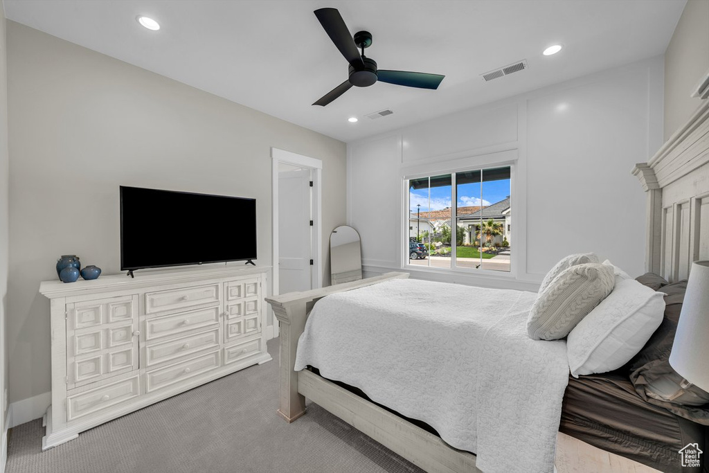 Bedroom with carpet floors, recessed lighting, and a ceiling fan