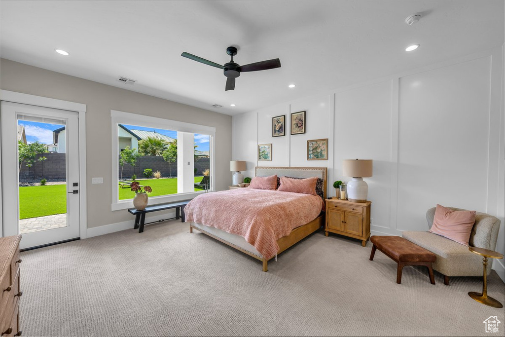 Bedroom with access to outside, light carpet, recessed lighting, a ceiling fan, and baseboards