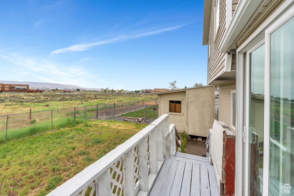 Balcony with a view of countryside and a mountain view