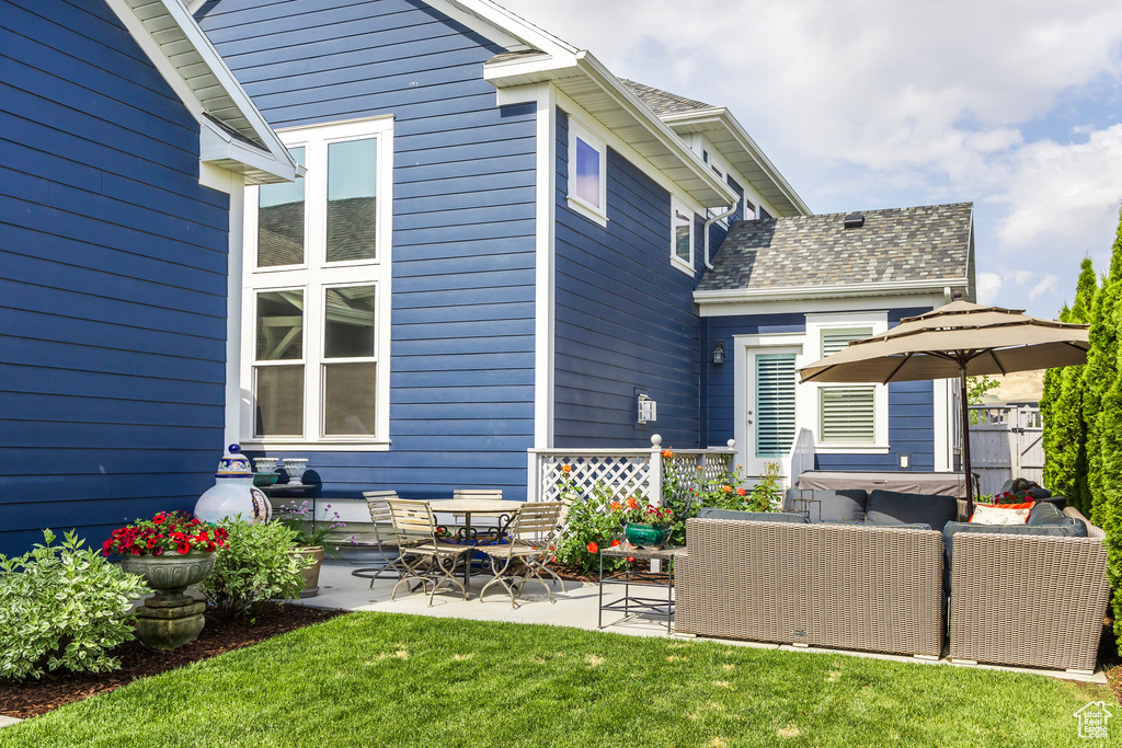 View of patio with an outdoor living space