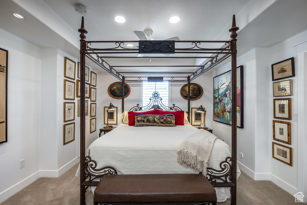 Bedroom featuring carpet, baseboards, and recessed lighting