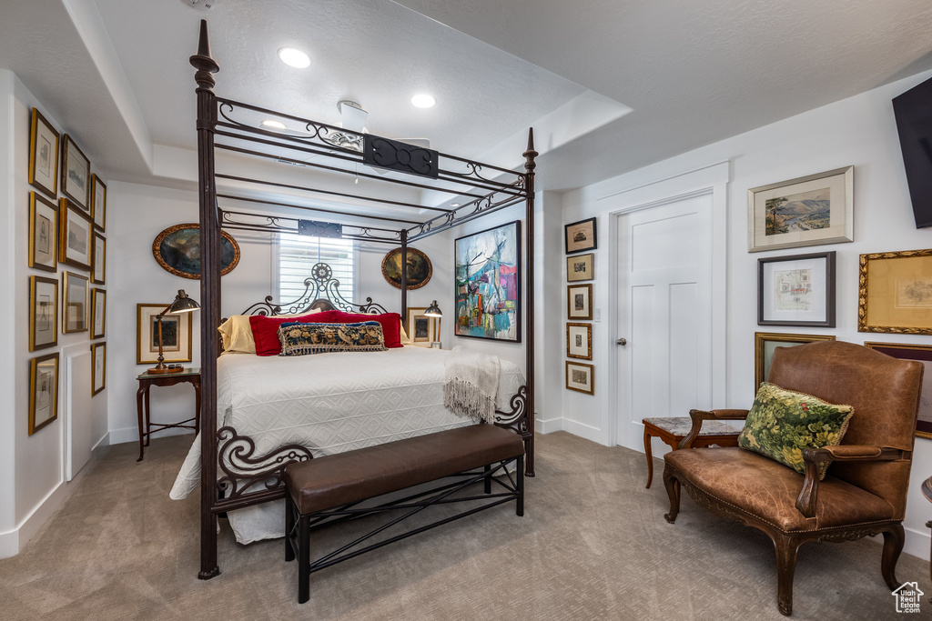 Bedroom featuring carpet flooring, baseboards, and recessed lighting