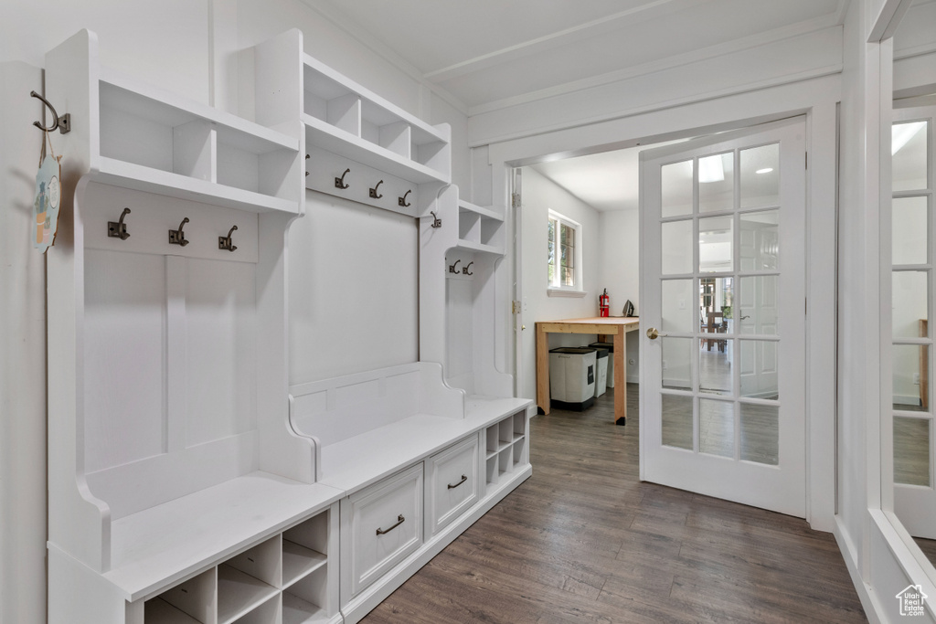 Mudroom with dark wood finished floors