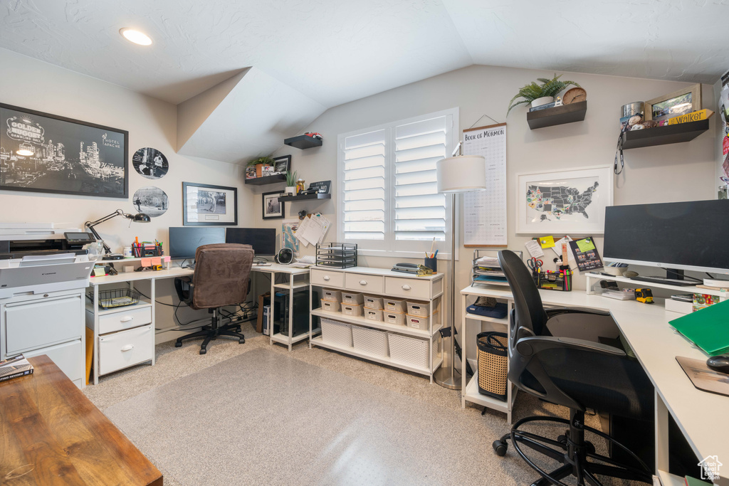 Office featuring lofted ceiling