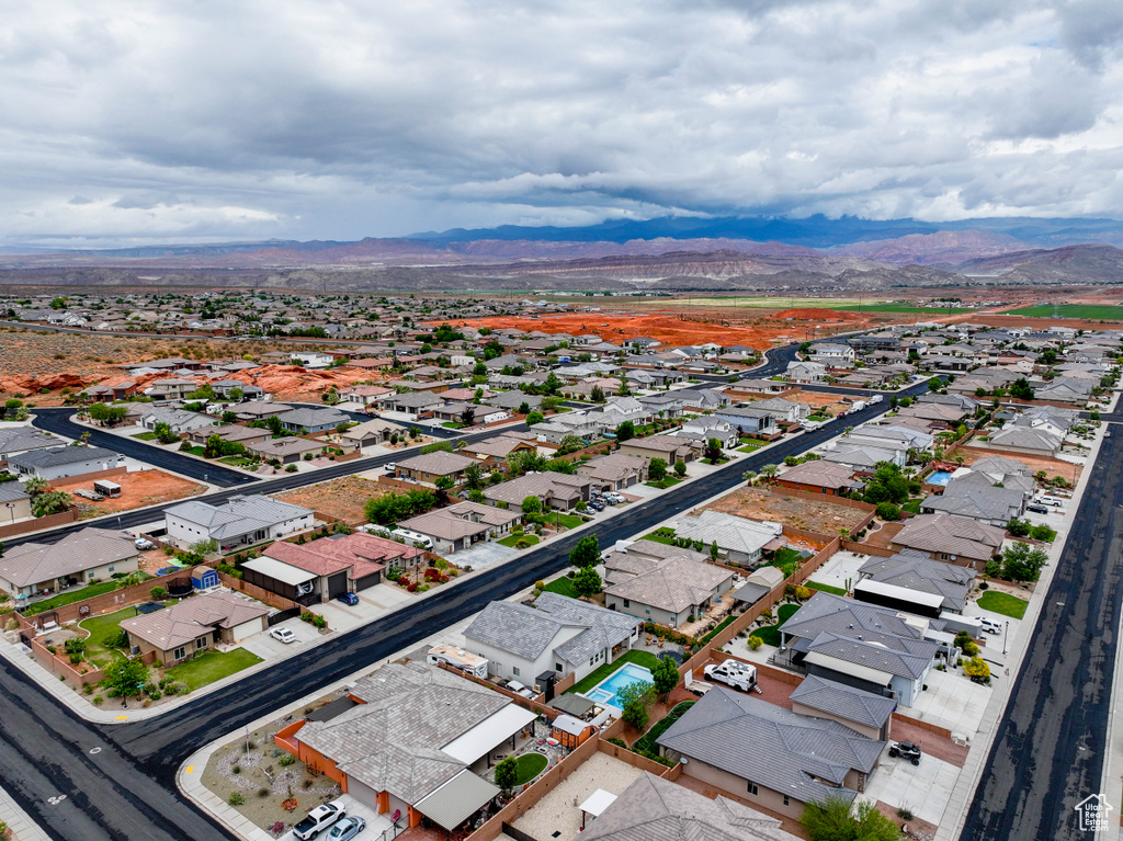Aerial view of residential area with a mountain backdrop