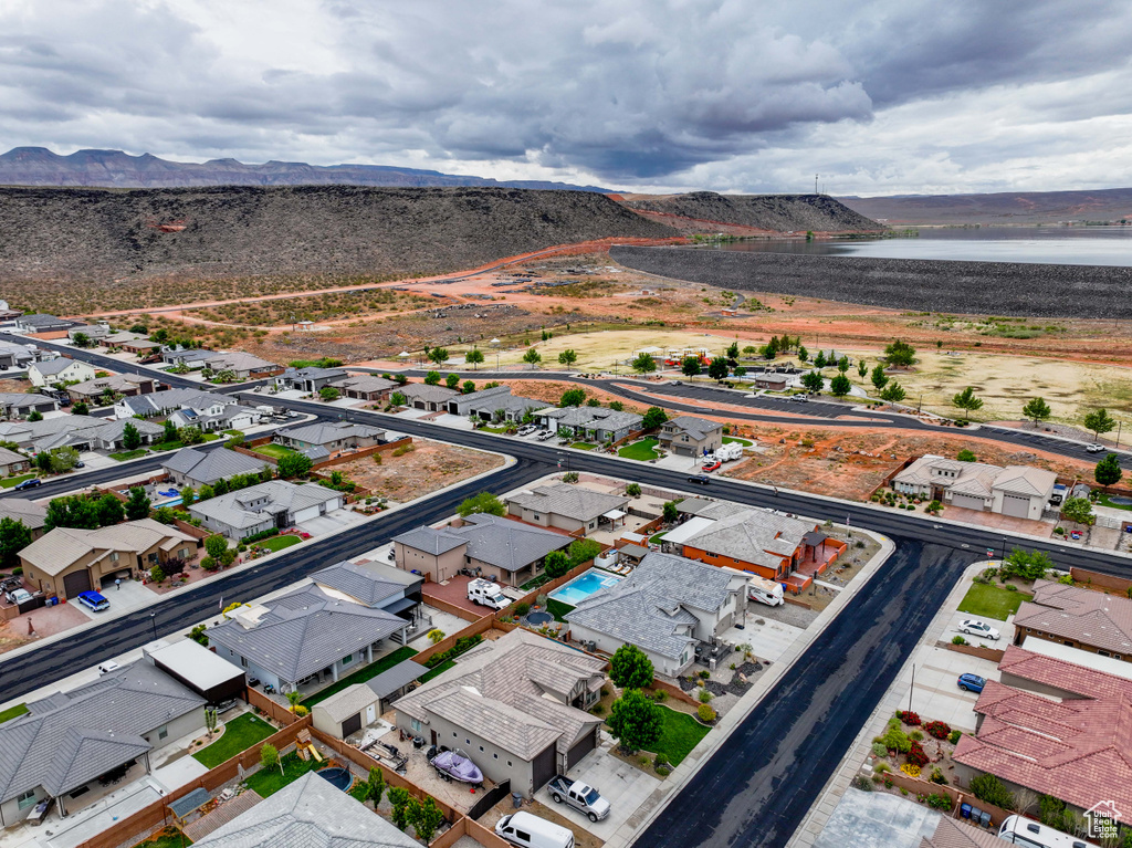 Aerial perspective of suburban area featuring a water and mountain view