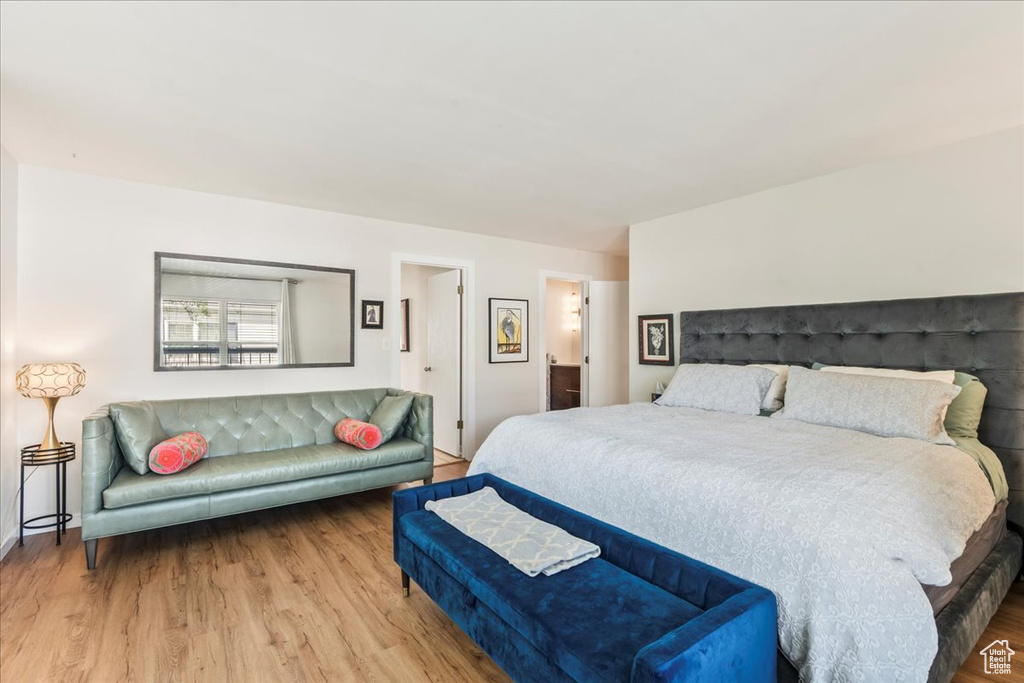 Bedroom with wood finished floors