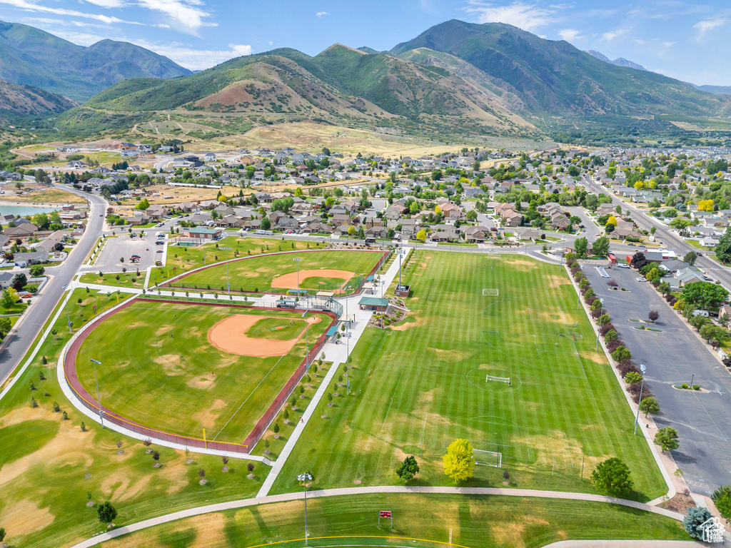Aerial view of residential area with a mountainous background