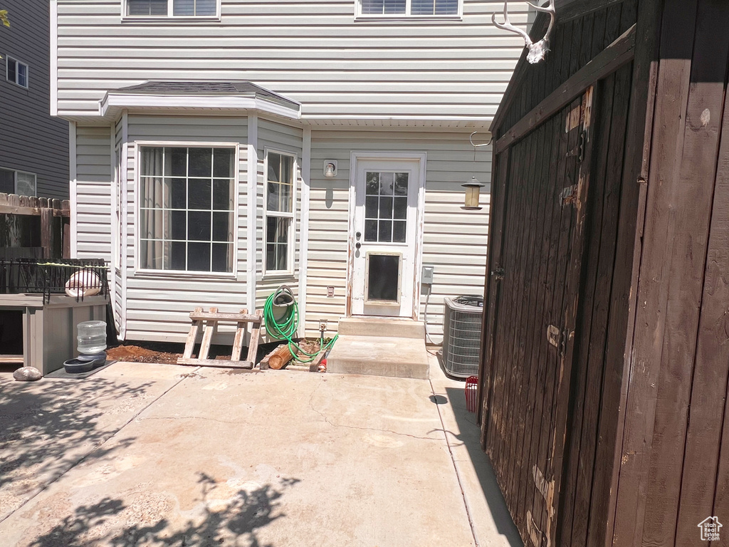 View of patio with central AC
