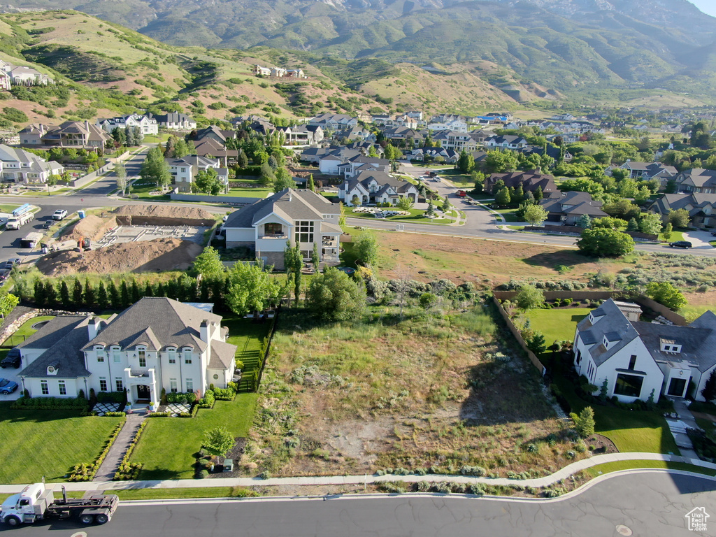 Aerial view of residential area with a mountainous background