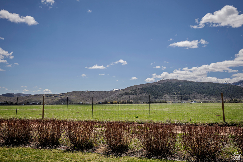 Mountain view with rural landscape and agricultural land