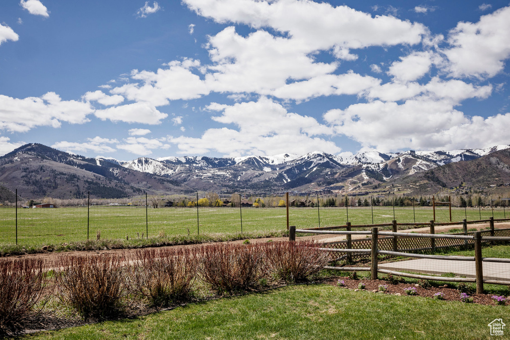 View of mountain backdrop featuring rural landscape