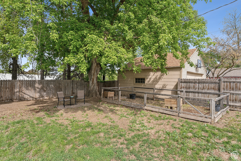 View of yard with a fenced backyard