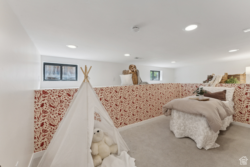 Bedroom featuring recessed lighting, baseboards, and carpet floors