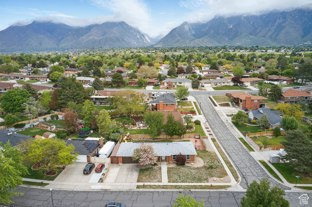 Aerial perspective of suburban area featuring mountains