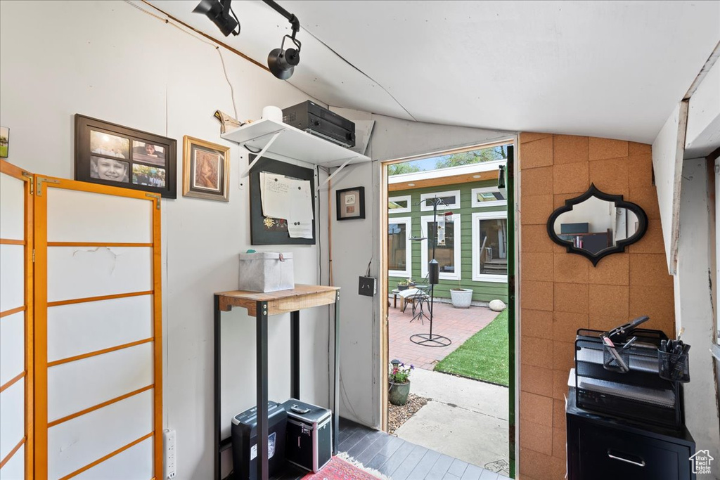 Entryway featuring lofted ceiling