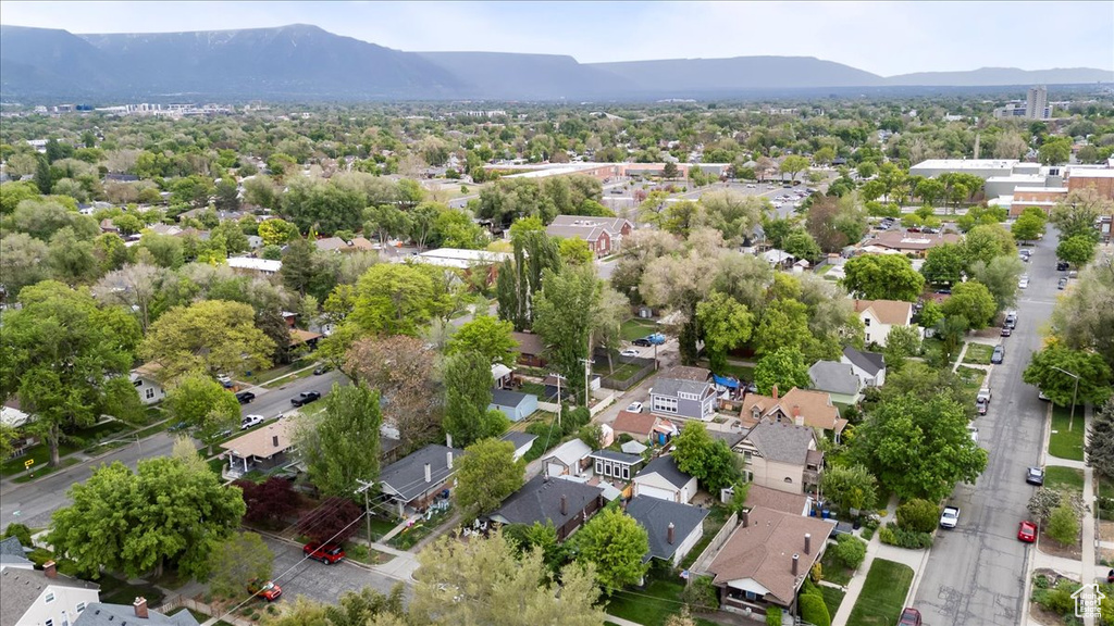 Drone / aerial view with a residential view and a mountain view