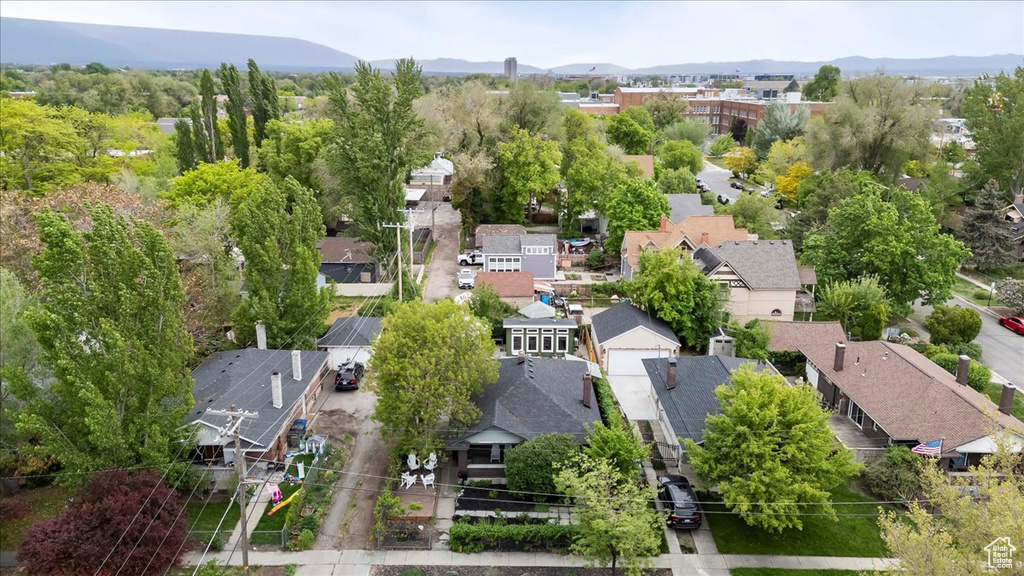 Drone / aerial view with a residential view and a mountain view