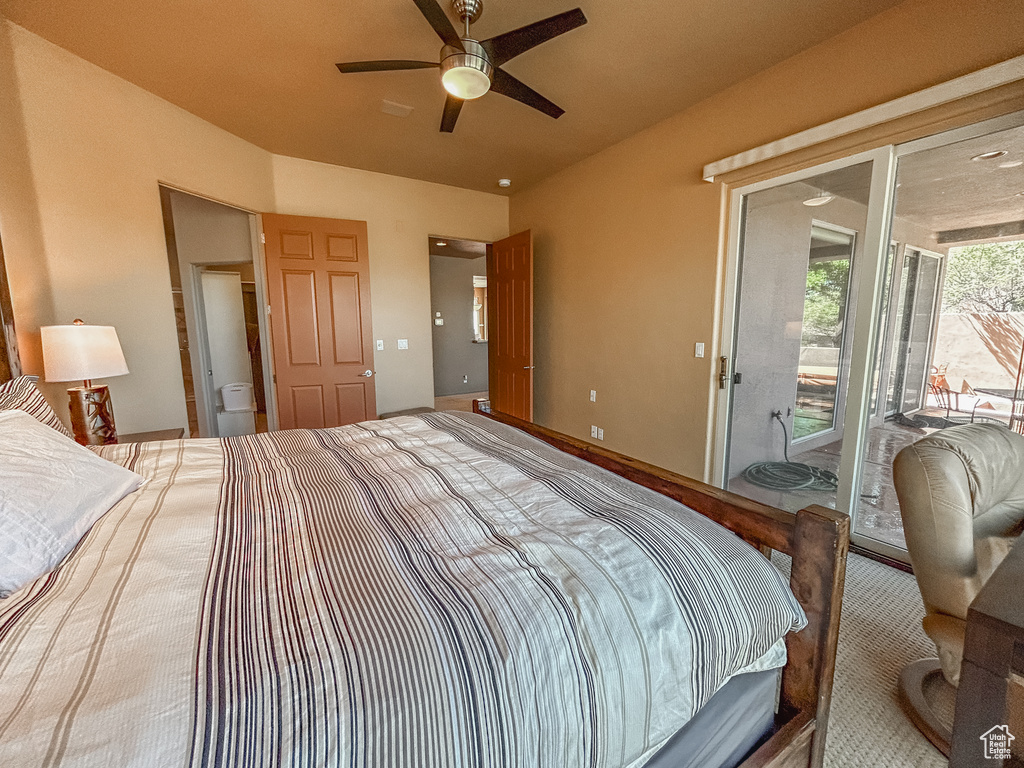 Bedroom featuring ceiling fan and access to exterior