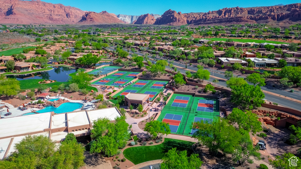 Bird's eye view of mountains and a pool area