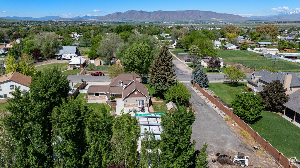 Aerial view of residential area with a mountainous background