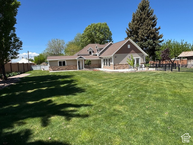 View of front of property with stone siding