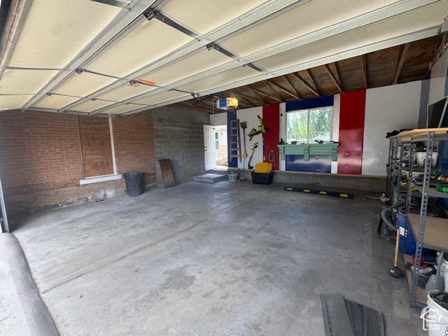 Garage featuring a garage door opener
