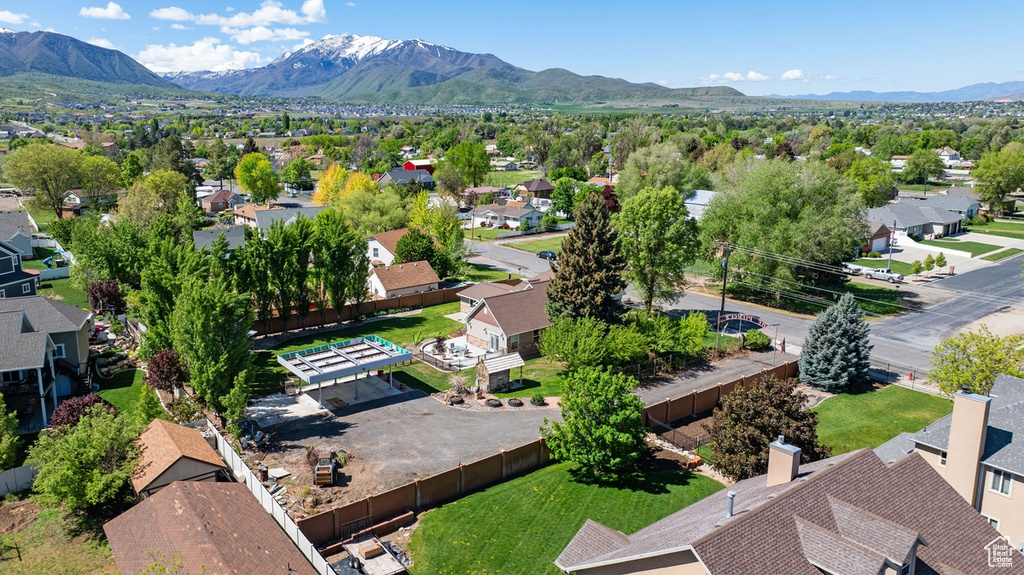 Aerial view of residential area with a mountainous background