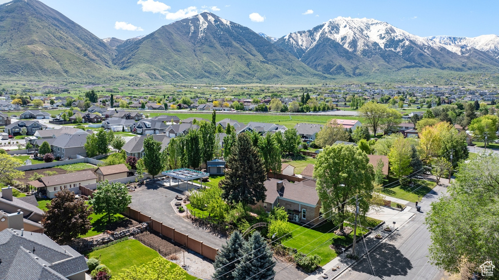 View of mountain background featuring nearby suburban area