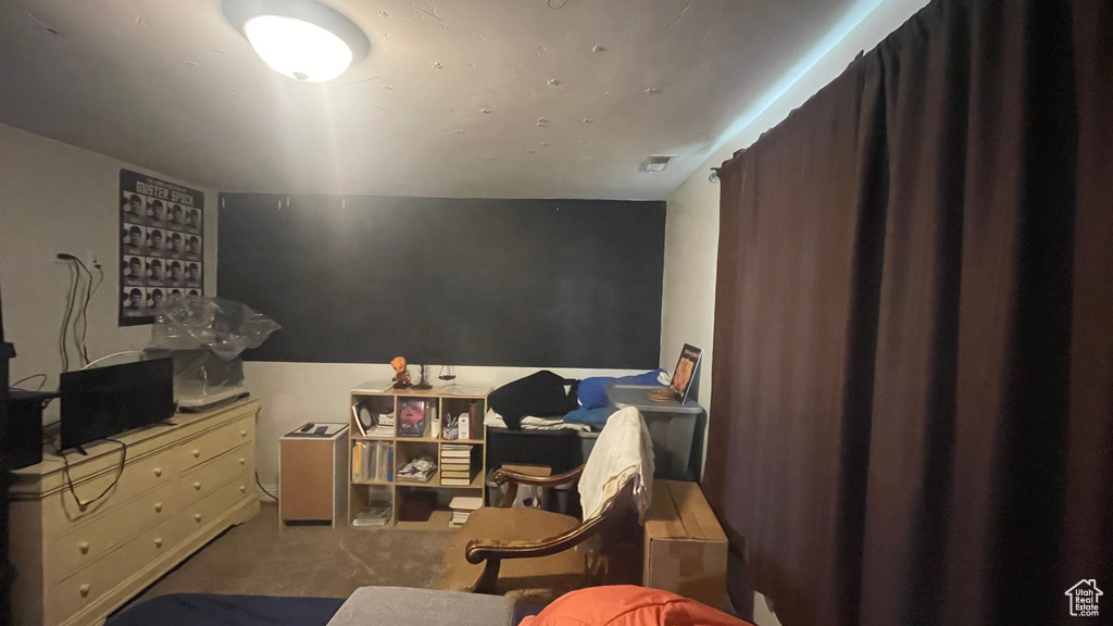 Bedroom with carpet flooring