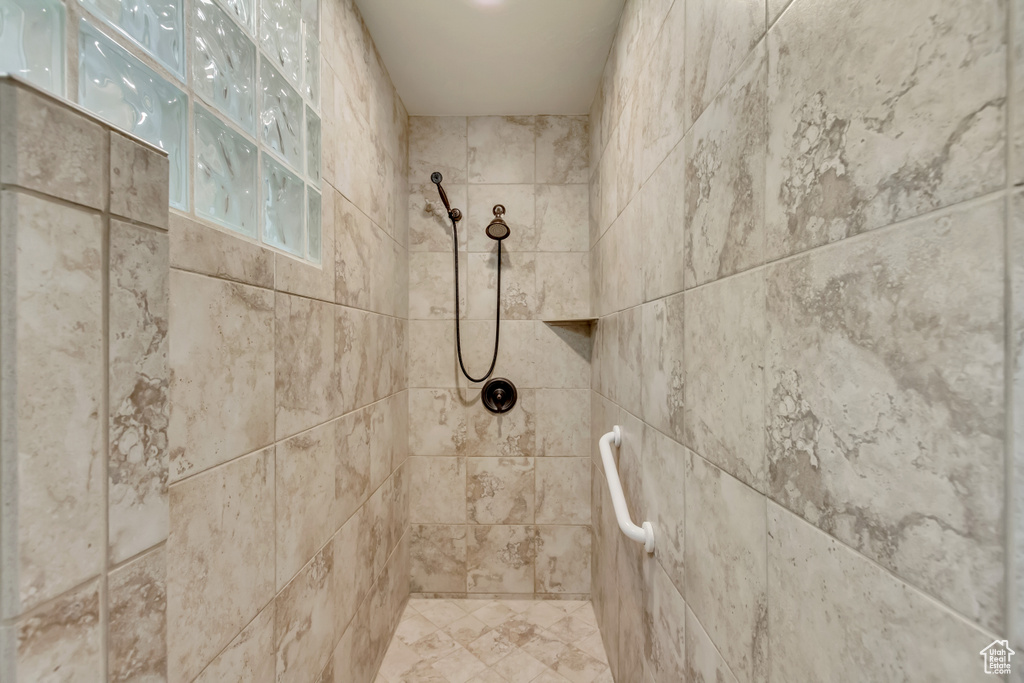 Bathroom with tiled shower