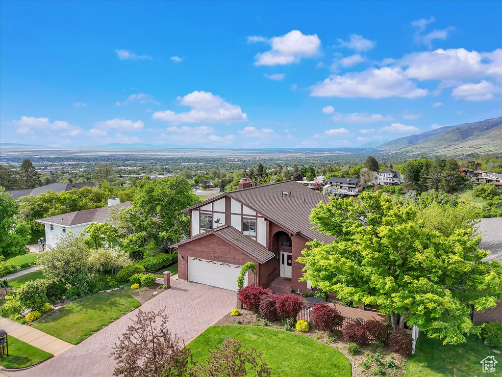 View of subject property with a mountainous background