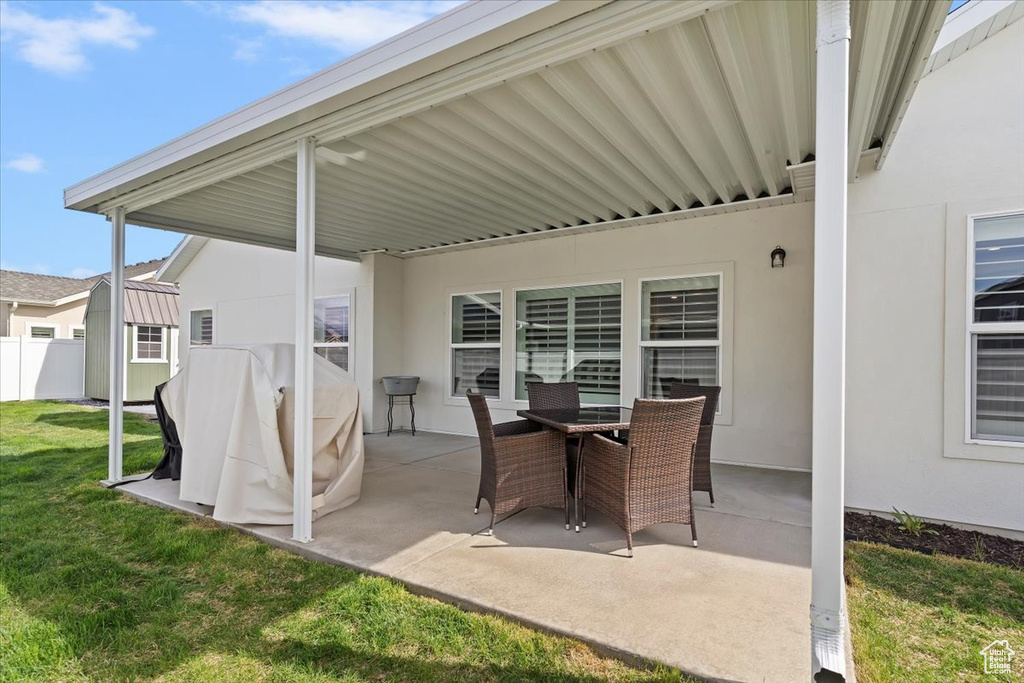 View of patio / terrace with a storage unit