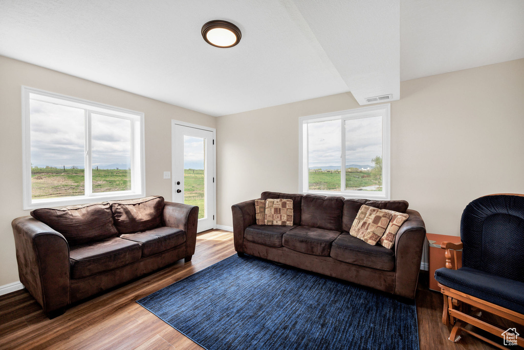 Living area with wood finished floors