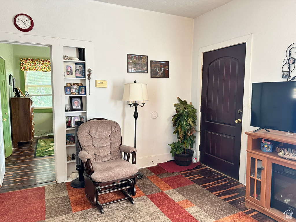 Entryway featuring wood finished floors and baseboards