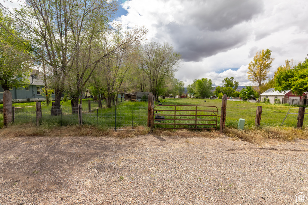 View of yard with a gate